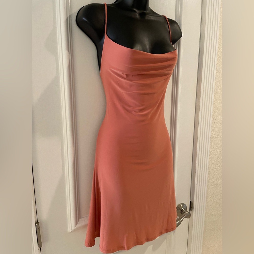 Slinky & sophisticated style backless mini in rich “pacific peach”color